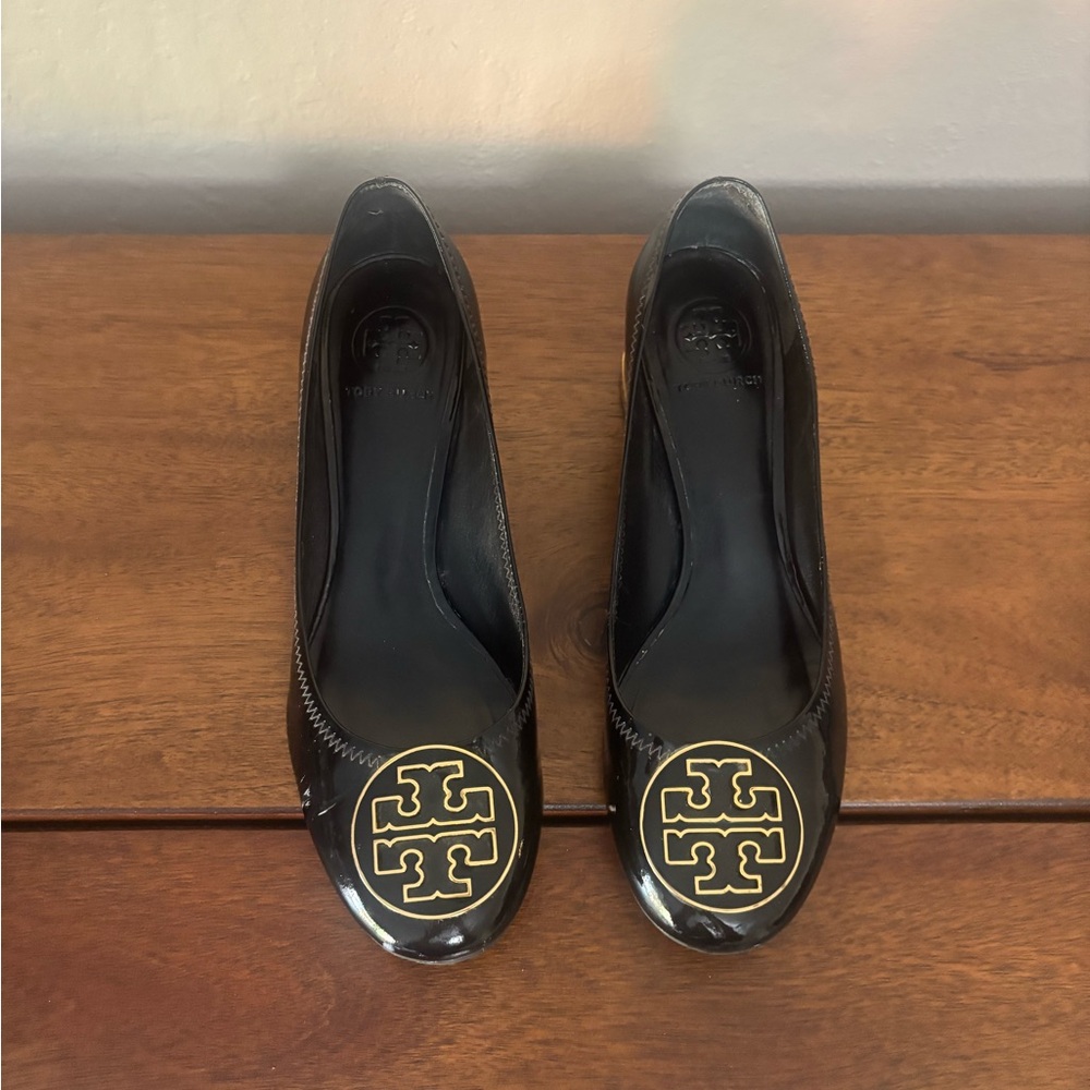 Tory Burch Black low heeled  with Gold Emblem
